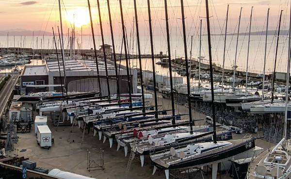 Sail boats ready for a regatta in the Marina di Scarlino shipyard.