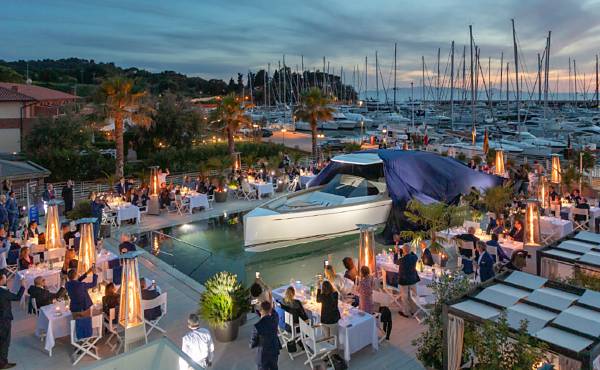 Popular event space amidst Marina di Scarlinos sea of masts.